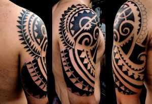 tatuagem maori no braço